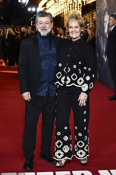 Andy Serkis looked dapper in a black suit and a dark blue patterned shirt as he attended the premiere alongside his wife Lorraine Ashbourne