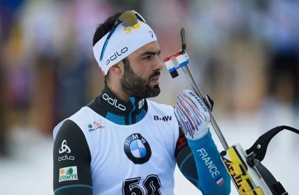 Simon Fourcade of France in action at the shooting range prior to the 10 km Men's Sprint during the BMW IBU World Cup Biathlon