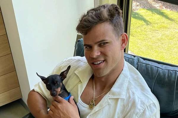 Kris Humphries posts a photo with his dog on Instagram