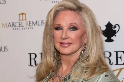 Morgan Fairchild at an event last March in Beverly Hills. She's looking directly into the camera and smiling.