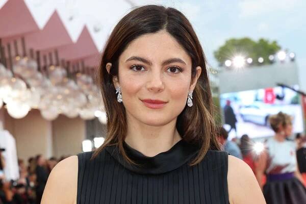 Monica Barbaro Suffers Windy Wardrobe Malfunction on the Venice Film Festival Red Carpet