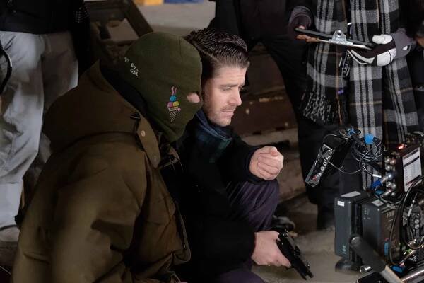 Jon Abrahams watching playback on the set of *Clover*