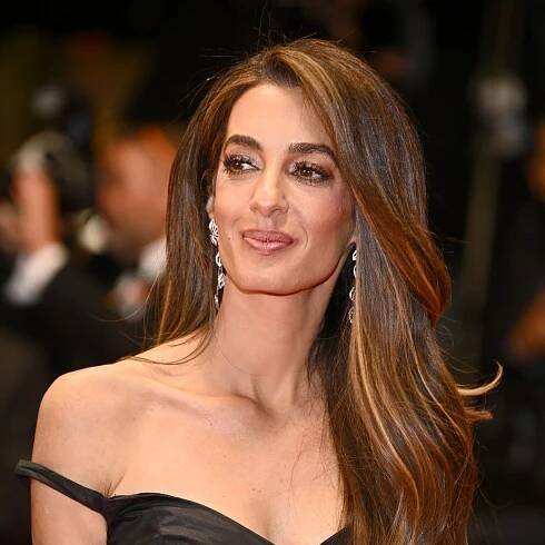 Amal Clooney stuns in rule-breaking dress for solo appearance at Cannes Film Festival