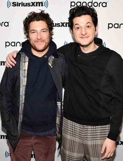 Adam Pally (L) and Ben Schwartz visit SiriusXM Studios on February 06, 2020 in New York City