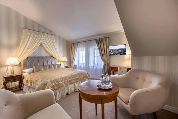 Postel nebo postele na pokoji v ubytování Hotel Hoffmeister
