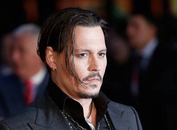 Johnny Depp spends $200,000 a month on a private jet and $30,000 on wine—here’s how else he blows his fortune
