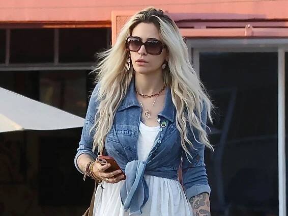 Paris Jackson wears a boho carefree outfit while out with her puppy