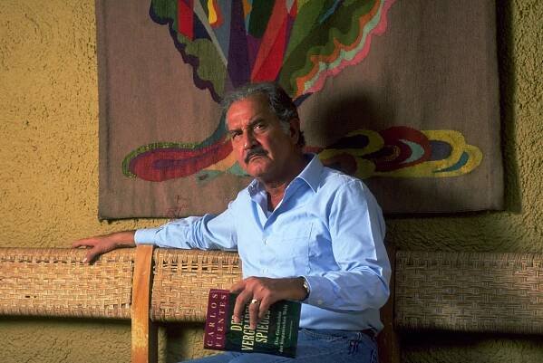 Carlos Fuentes at home in Mexico City in the 1980s. (© Sergio Dorantes/CORBIS)
