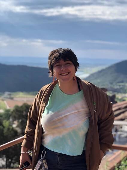 photo of Marlen smiling and standing outside