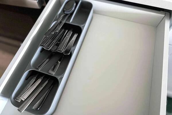 This $12 Kitchen Tool Instantly Organized My Narrow Kitchen Drawers