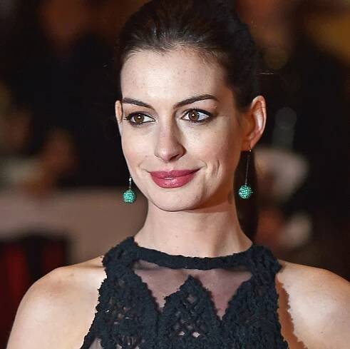 Anne Hathaway channels Priscilla Presley with new bouffant hairstyle