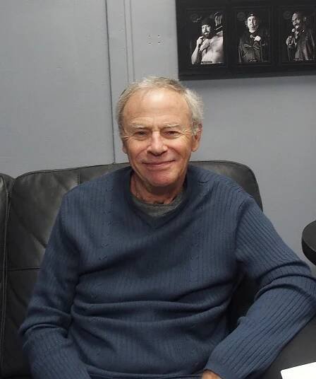 Tristan Rogers in a blue sweatshirt.