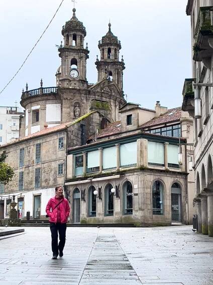 Celine Brewer enjoys an early morning walk through an empty old town in Pontevedra, Spain.
