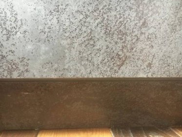 Neolith Iron Grey Chip Repairs | chips near the bottom of doors done