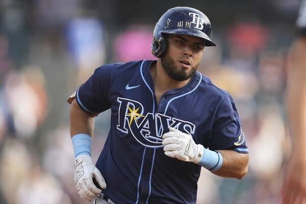 Tampa Bay Rays baseball player running on the field.