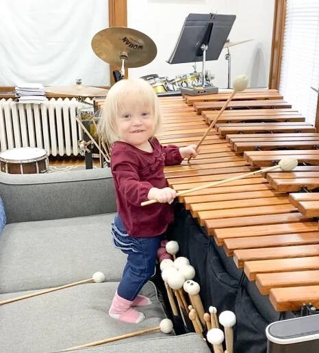 A child playing a marimba in St. Cloud School of Music