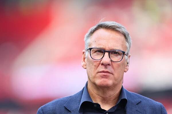 Paul Merson working as a pundit for Sky Sports.