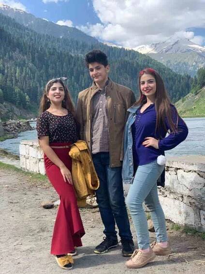 Dananeer Mobeen with her sister and brother