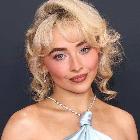 Sabrina Carpenter Teases Cheeky New Music in Dolly Parton-Inspired Jean Shorts