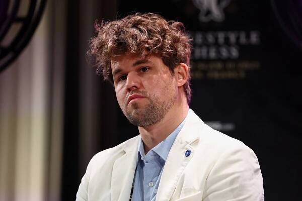 Magnus Carlsen held to draw by 143,000 opponents in largest ever online chess game after 46 days of competing