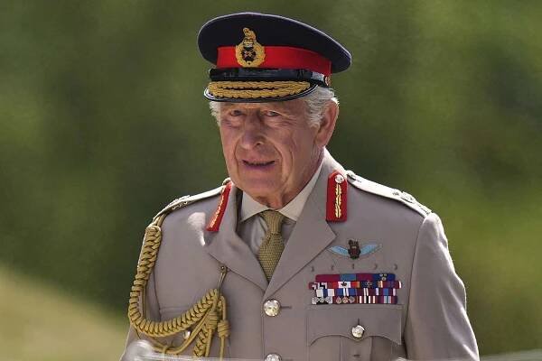 King Charles III looks on as he attends the Service of Remembrance to commemorate the 80th Anniversary of VJ Day at The National Memorial Arboretum