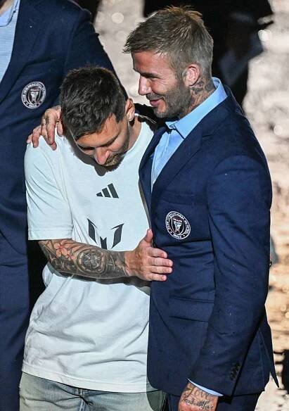 Argentine soccer star Lionel Messi (2nd L) is presented by (from R) owners of Inter Miami CF David Beckham