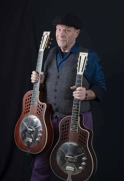 Steve James with his National Reso-Rocket WB signature model and original prototype