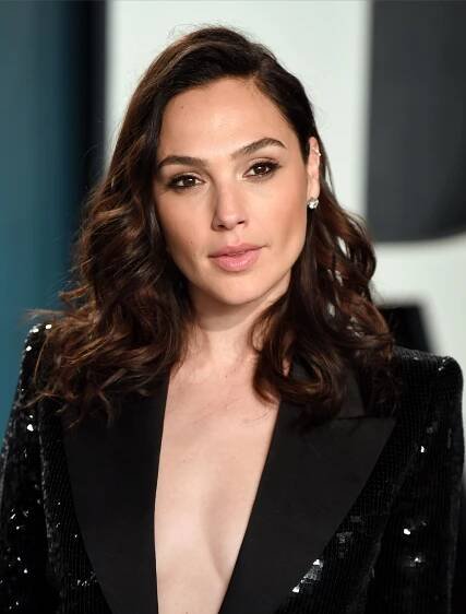Image may contain Gal Gadot Clothing Apparel Jacket Coat Human Person Face and Leather Jacket