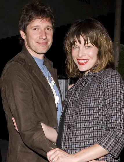 Milla Jovovich and Paul W.S. Anderson at the La Cienega Blvd. in West Hollywood, California.