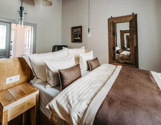 Postel nebo postele na pokoji v ubytování Boutique hotel Corso