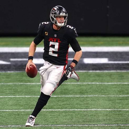 Matt Ryan Running And Holding A Ball Wallpaper