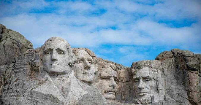 Mount Rushmore is pictured on a cloudy day.