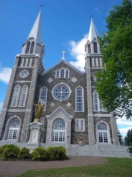 double-spired cathedrals dot the Charlevoix countryside