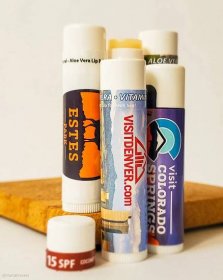 assortment of lip balm containers