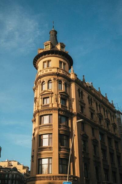 A tall building with a clock on the top of it