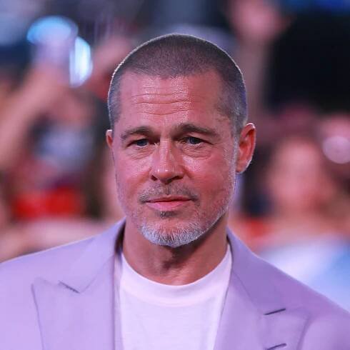 Brad Pitt just buzzed his head, and we suddenly remember why Ocean's 12 looked so cool