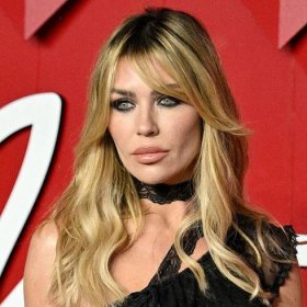 Abbey Clancy is all legs as she wows in risqué swimsuit
