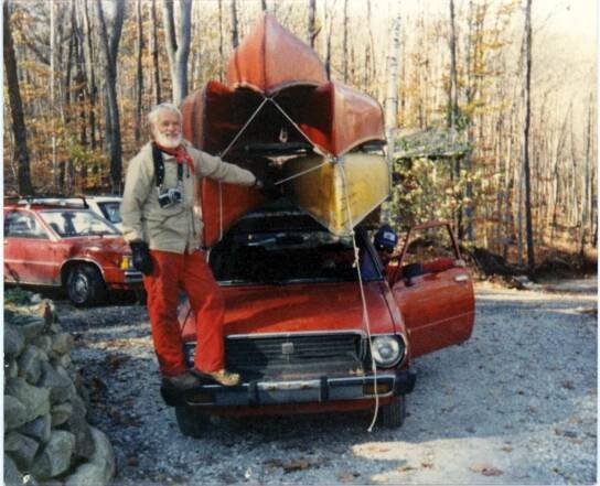 Bill Mason 5 canoes on car