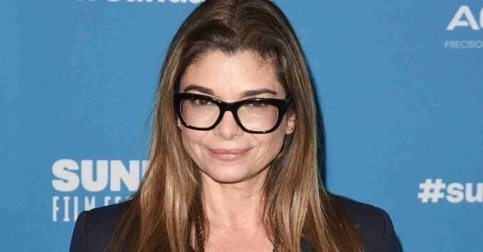 Laura San Giacomo on red carpet