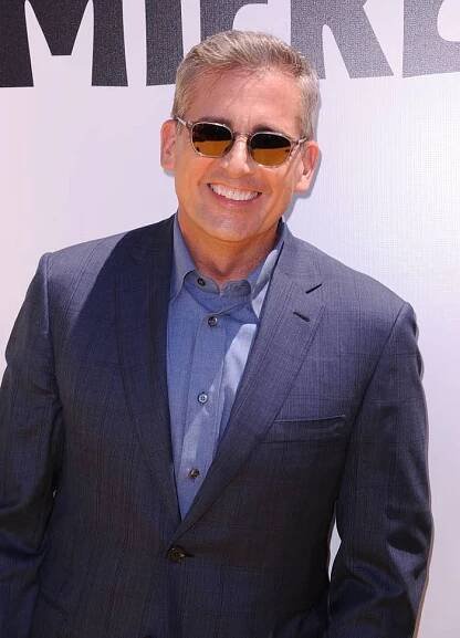 Steve Carell smiling on a red carpet