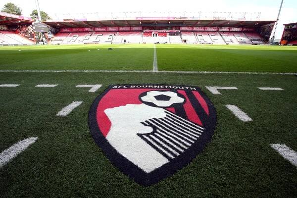 AFC Bournemouth logo on the center of the pitch.