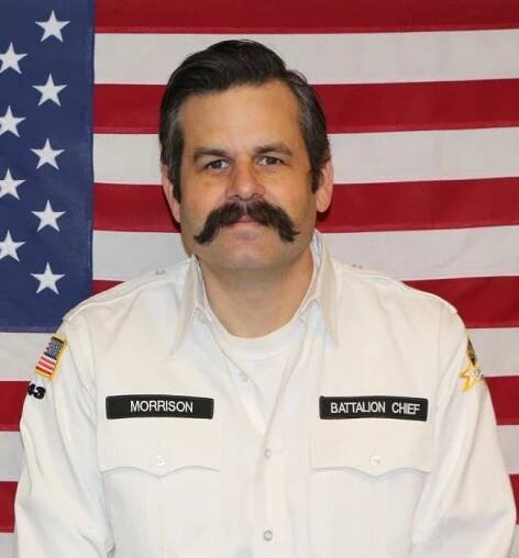 Portrait of Battalion Chief John Morrison in uniform.