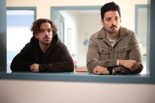 Still from Found Season 2 Episode 22 of Henri Esteve as Mike and Karan Oberoi as Dahn pictured from left to right.