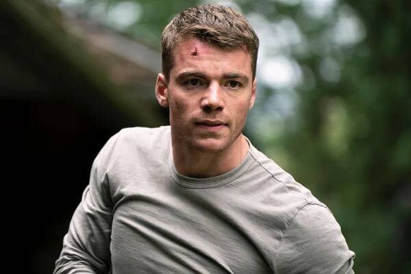 Gabriel Basso as Peter Sutherland in episode 110 of The Night Agent.