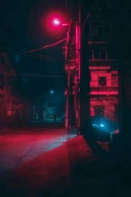 Neon Red Aesthetic Light Illuminating A Street Wallpaper