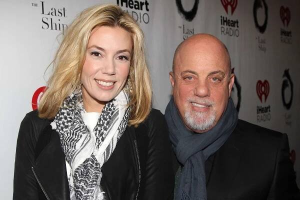  Alexis Roderick and Billy Joel pose at The Opening Night of "The Last Ship" on Broadway at The Neil Simon Theatre on October 26, 2014 in New York City.