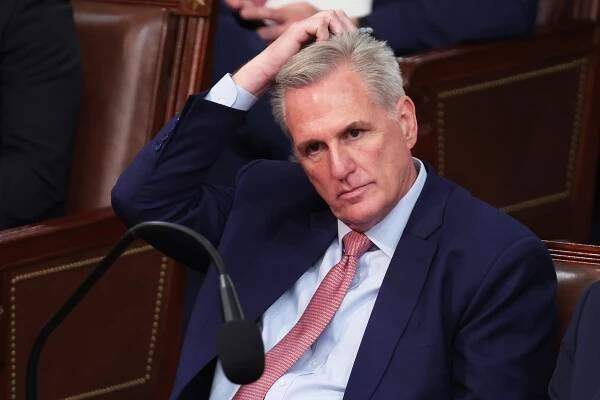 WASHINGTON, DC - JANUARY 03: U.S. House Minority Leader Kevin McCarthy (R-CA) reacts as Representatives cast their votes for Speaker of the House on the first day of the 118th Congress in the House Chamber of the U.S. Capitol Building on January 03, 2023 in Washington, DC. Today members of the 118th Congress will be sworn-in and the House of Representatives will elect a new Speaker of the House. (Photo by Win McNamee/Getty Images)