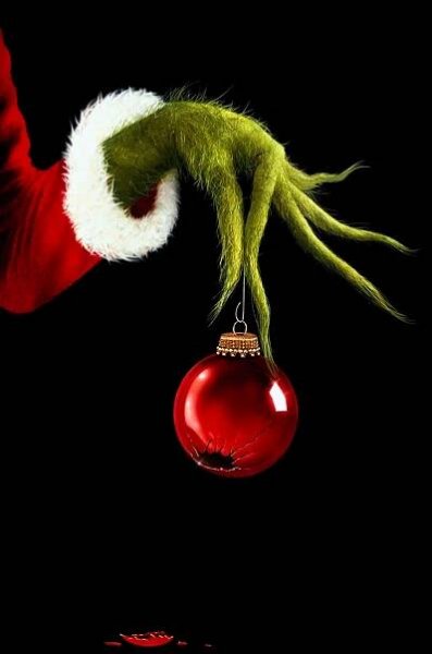Download Caption: The Grinch Holding a Christmas Ball - Disney Christmas Theme for iPhone Wallpaper