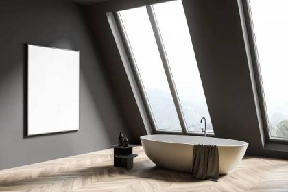 Minimalismus této koupelny rozsvěcují velká okna (Foto: Shutterstock)