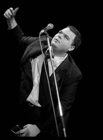 Photo of David THOMAS and PERE UBU; David Thomas performing at North London Polytechnic